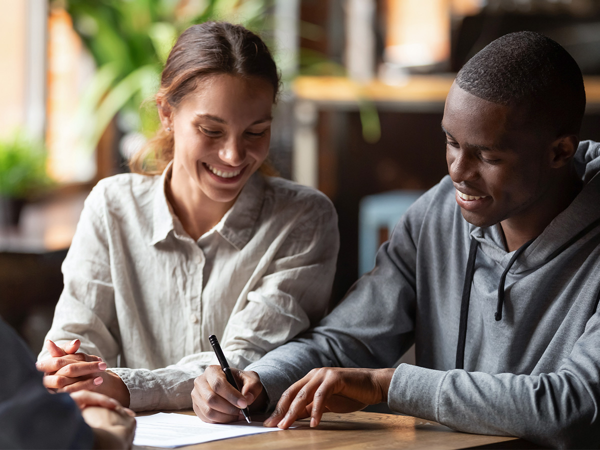 Young couple applying for individual insurance