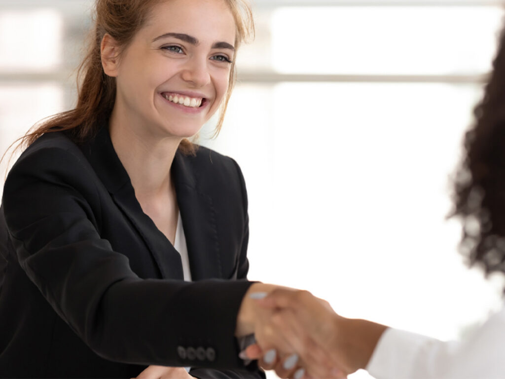 woman shaking hand