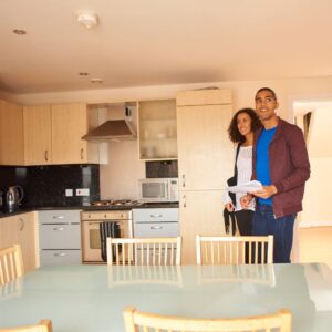 couple looking at kitchen