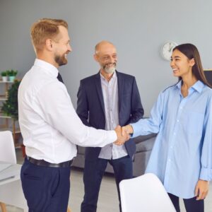 employer and employee shaking hands
