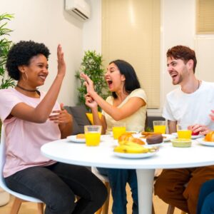 airbnb hosts enjoying breakfast with renter