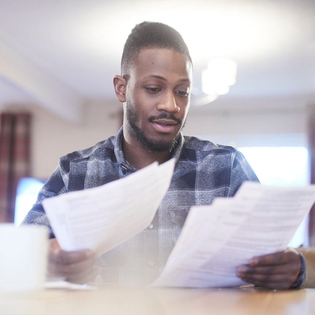 image of a man looking at insurance