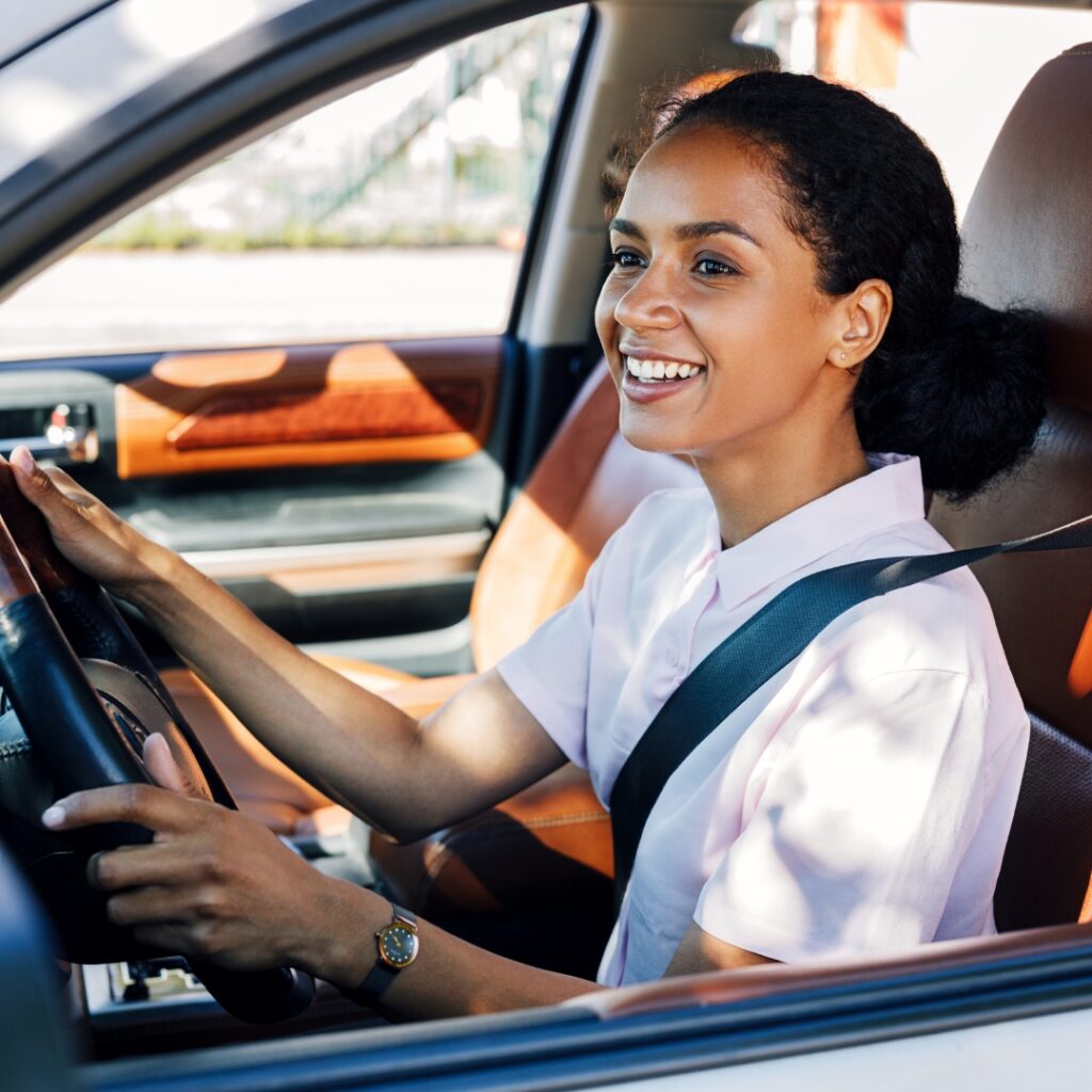 image of a woman driving