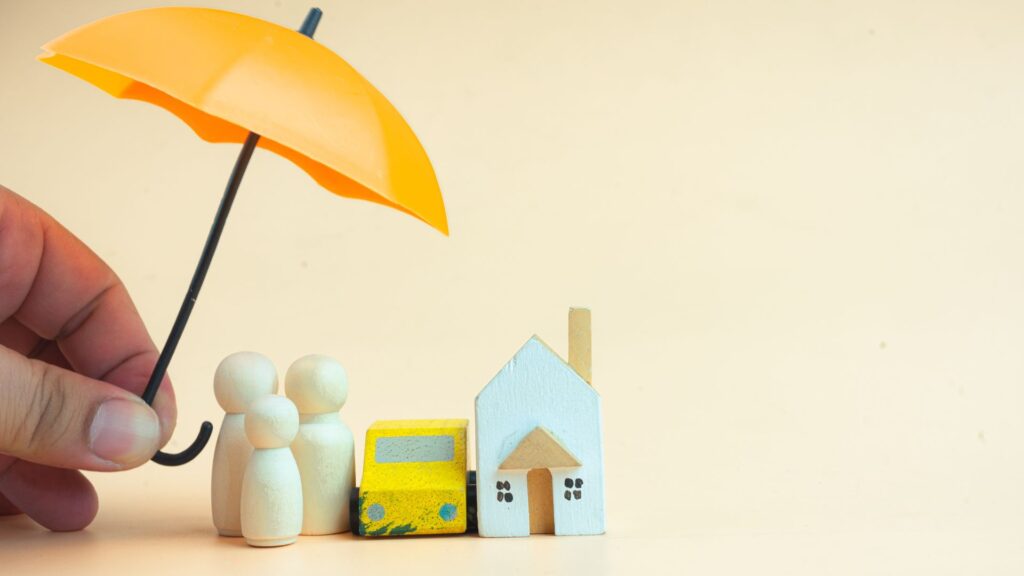 umbrella over family and house